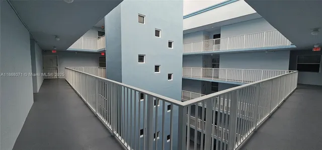 a view of a garage with chairs