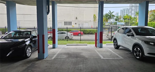 a view of an empty room with washing machine