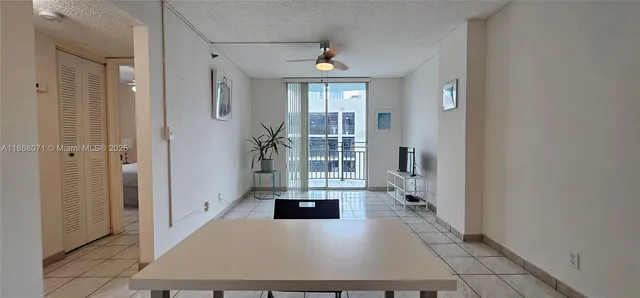 a view of a hallway with windows