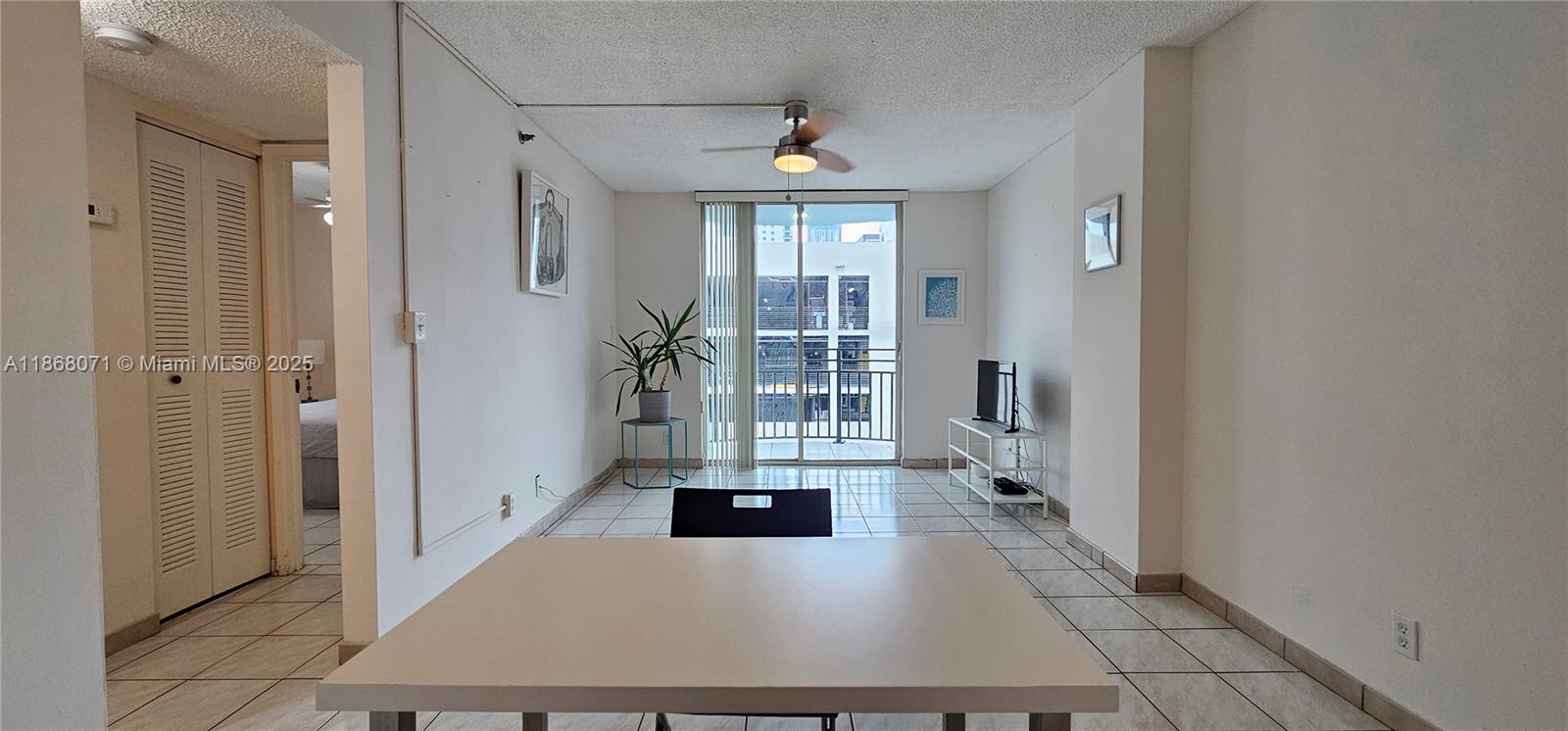 501 Southwest 1st Street, Unit 507 Miami, FL 33130 - Photo 4 of 25 a view of a hallway with windows
