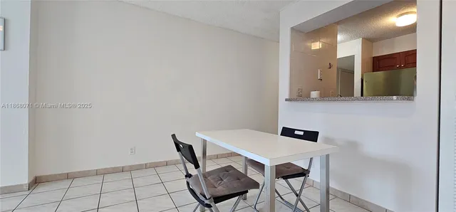 a view of a workspace with furniture