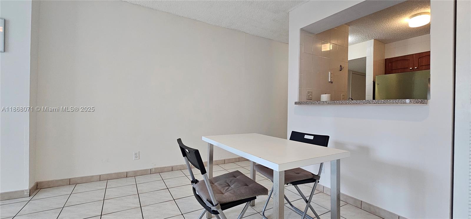 501 Southwest 1st Street, Unit 507 Miami, FL 33130 - Photo 6 of 25 a view of a workspace with furniture