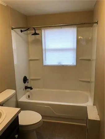 a bathroom with a sink and a toilet