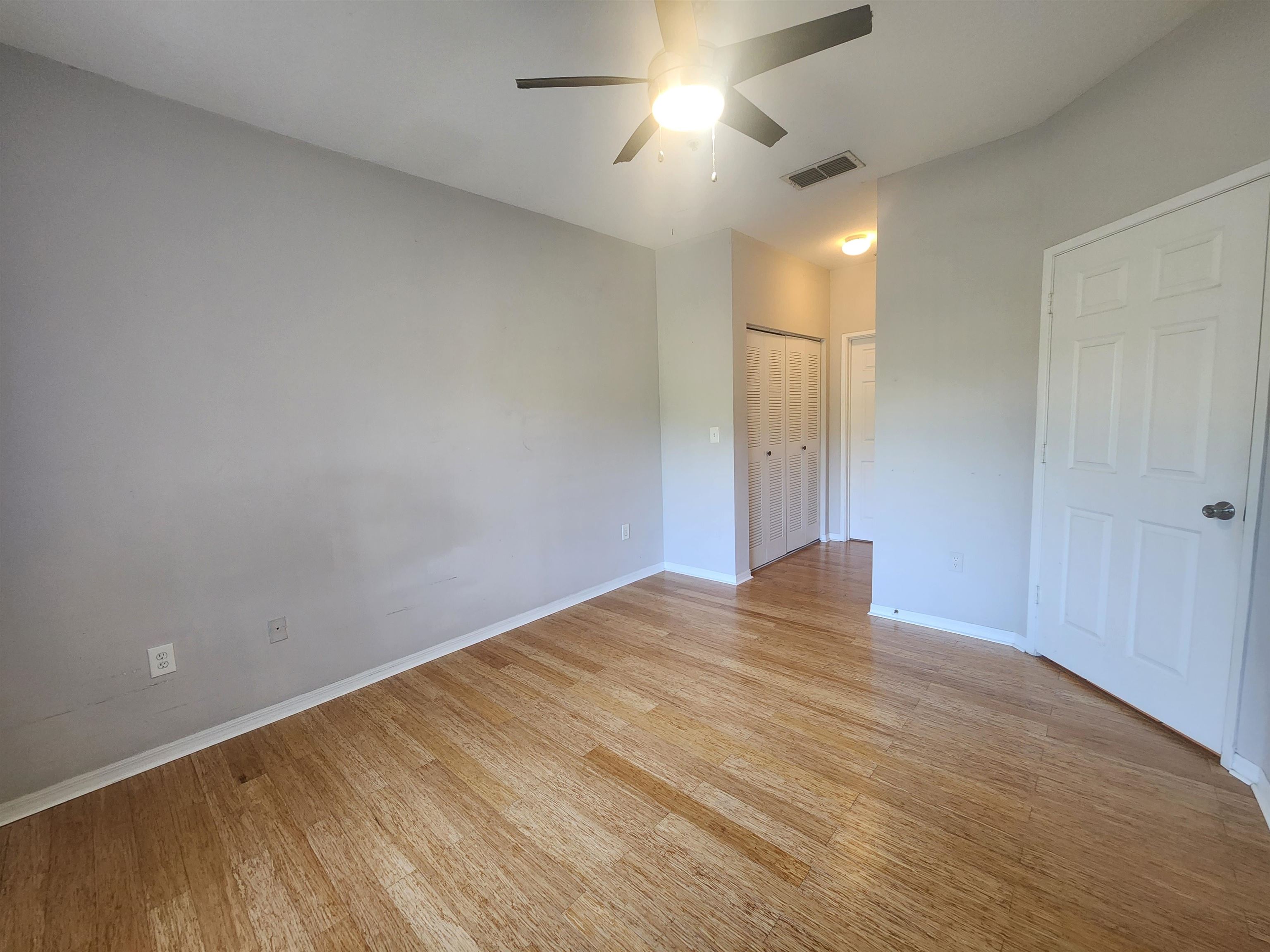 510 Florida Club Boulevard, Unit 304 St. Augustine, FL 32084 - Photo 14 of 24 wooden floor in an empty room