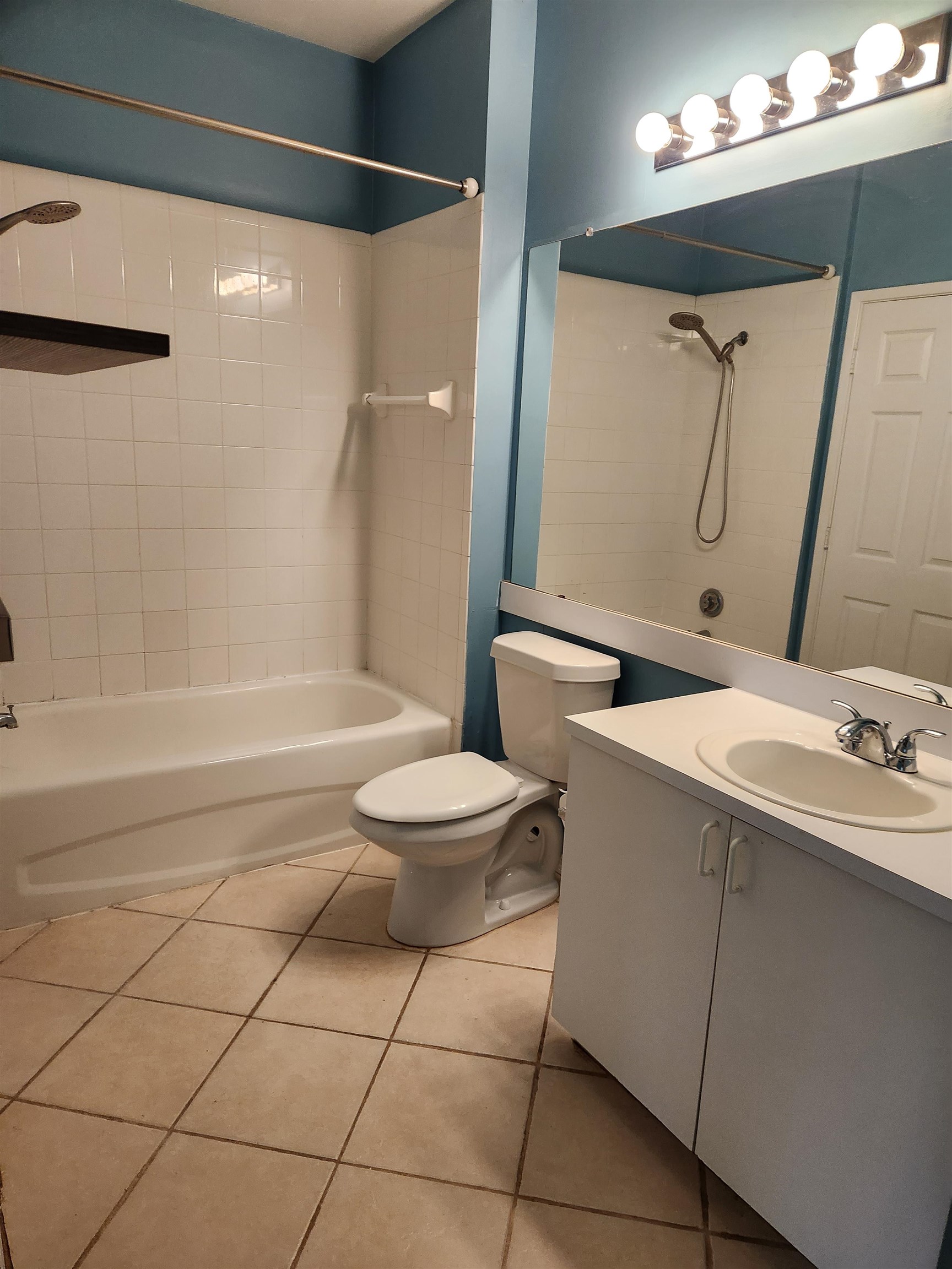 510 Florida Club Boulevard, Unit 304 St. Augustine, FL 32084 - Photo 17 of 24 a bathroom with a toilet sink and shower