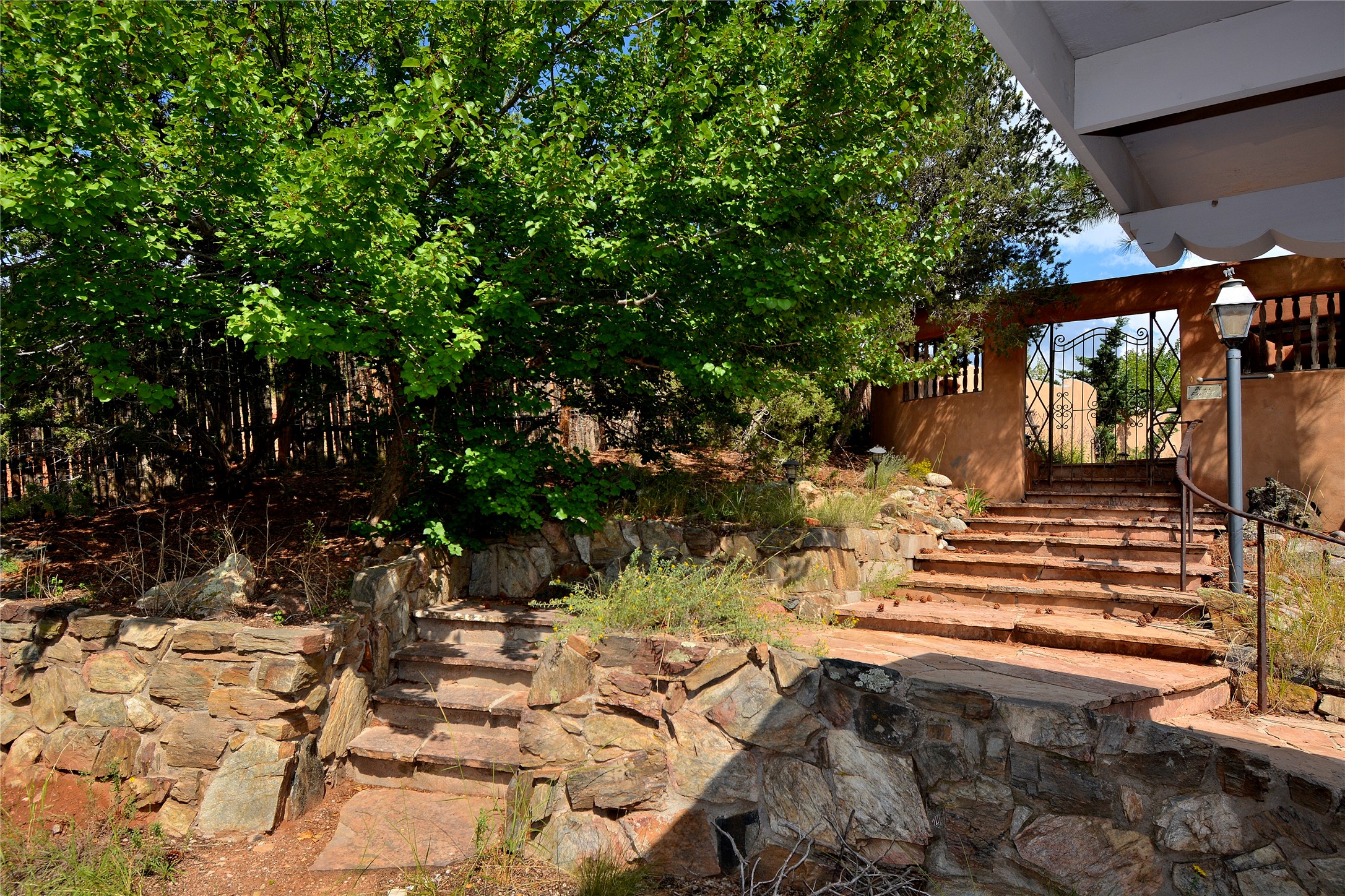 904 Bishops Lodge Road Santa Fe, NM 87501 - Photo 3 of 51 Steps leading to upstairs entry