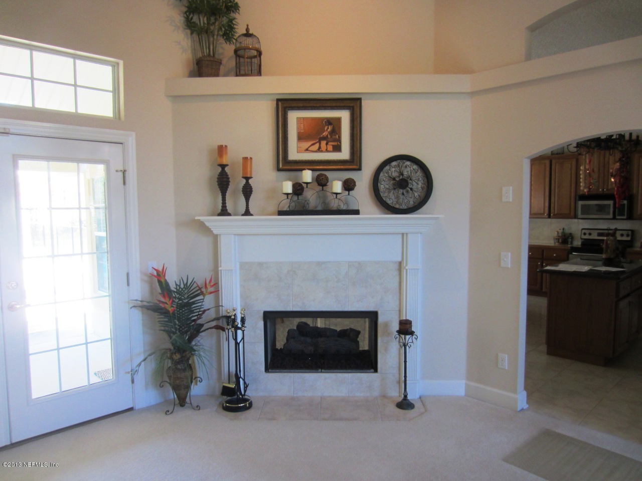 1050 Cactus Cut Road Middleburg, FL 32068 - Photo 22 of 54 a living room with furniture and a fireplace
