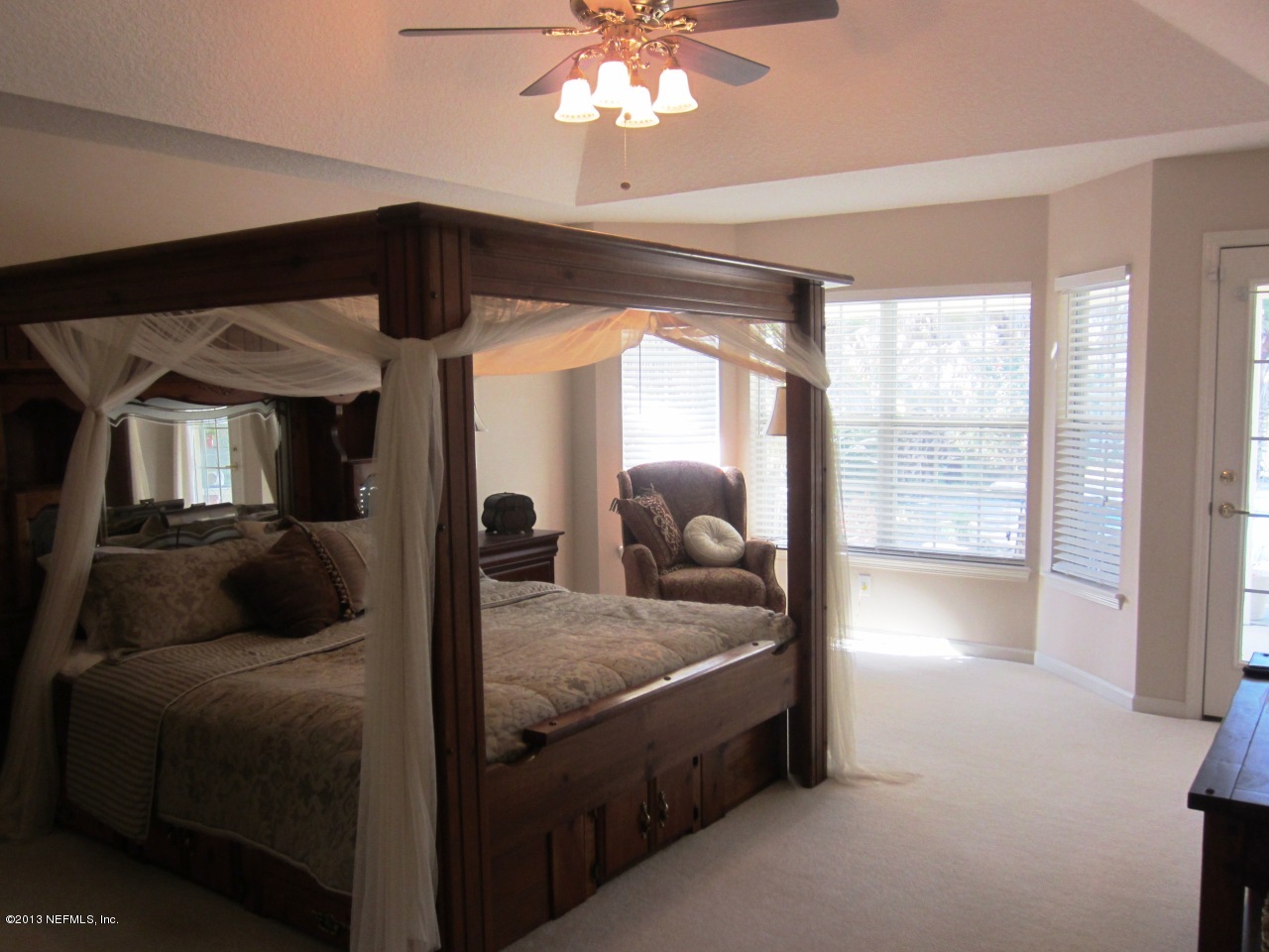 1050 Cactus Cut Road Middleburg, FL 32068 - Photo 28 of 54 a living room with furniture and a large window