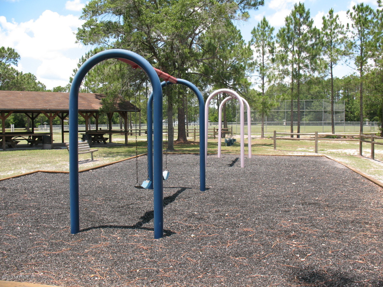 1050 Cactus Cut Road Middleburg, FL 32068 - Photo 51 of 54 a view of outdoor space with garden and deck