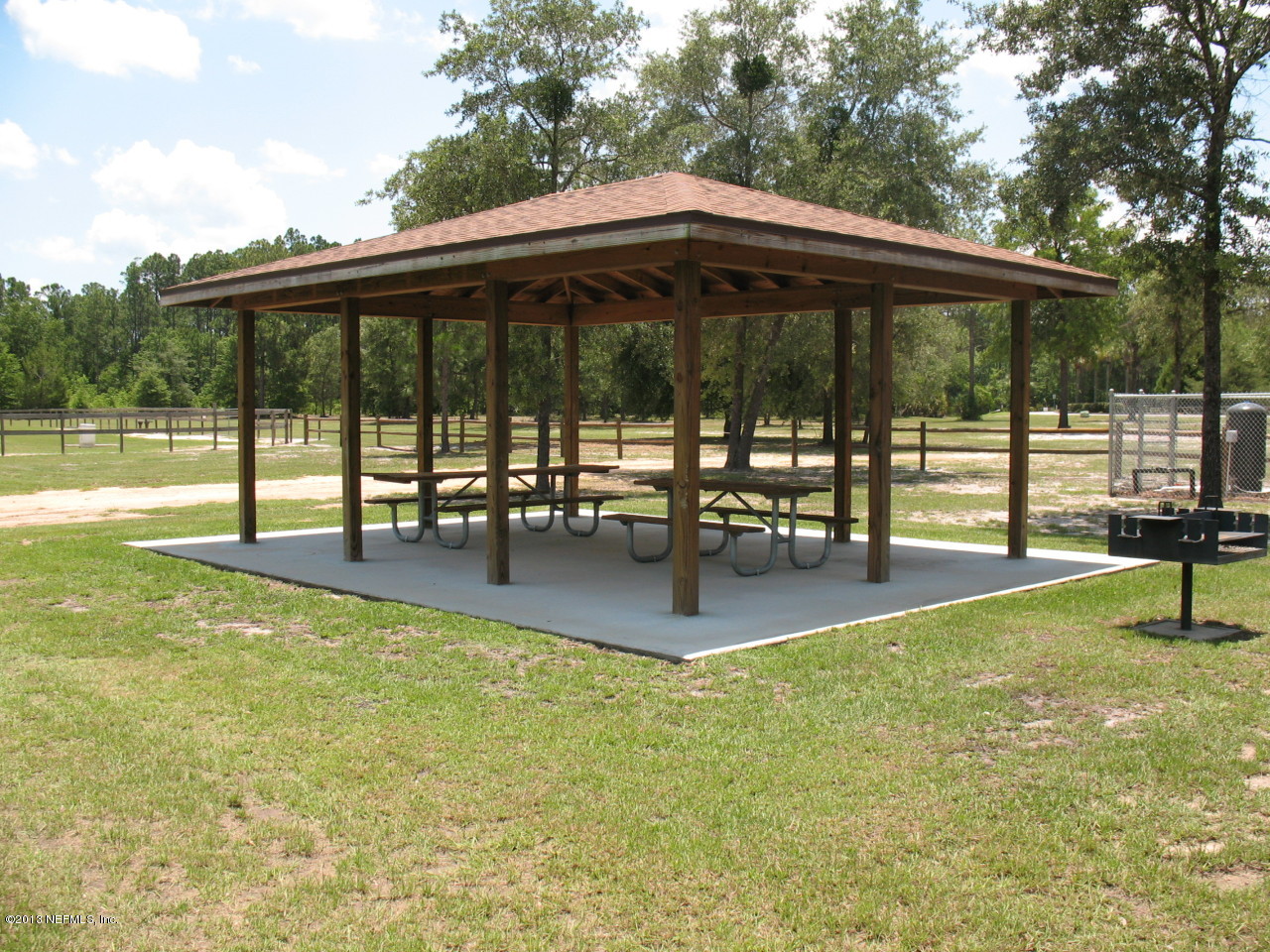 1050 Cactus Cut Road Middleburg, FL 32068 - Photo 53 of 54 swimming pool view with a garden space