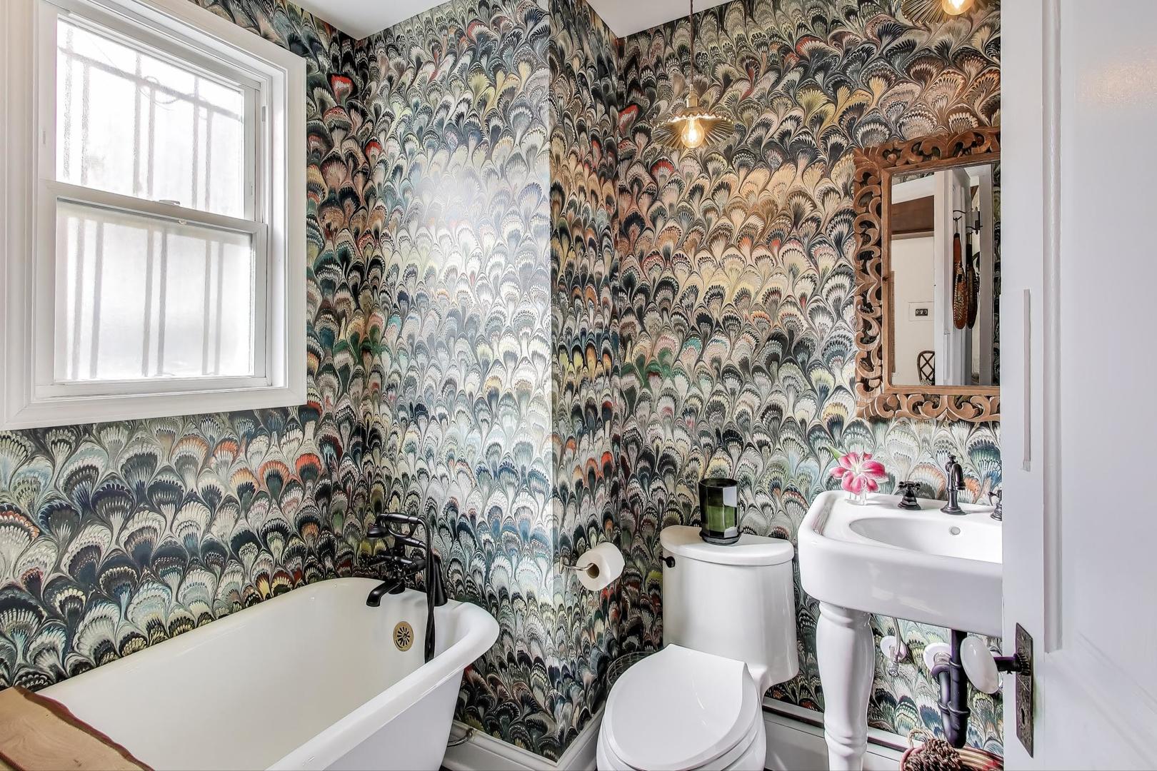 1951 West Evergreen Avenue Chicago, IL 60622 - Photo 13 of 29 a bath room with a toilet and a shower curtain