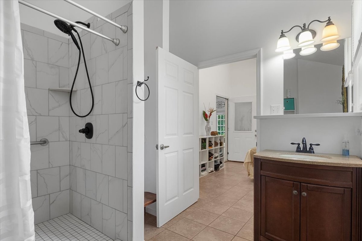 100 Croff Lane McEwen, TN 37101 - Photo 16 of 63 a en suite bathroom with a shower a mirror and a sink
