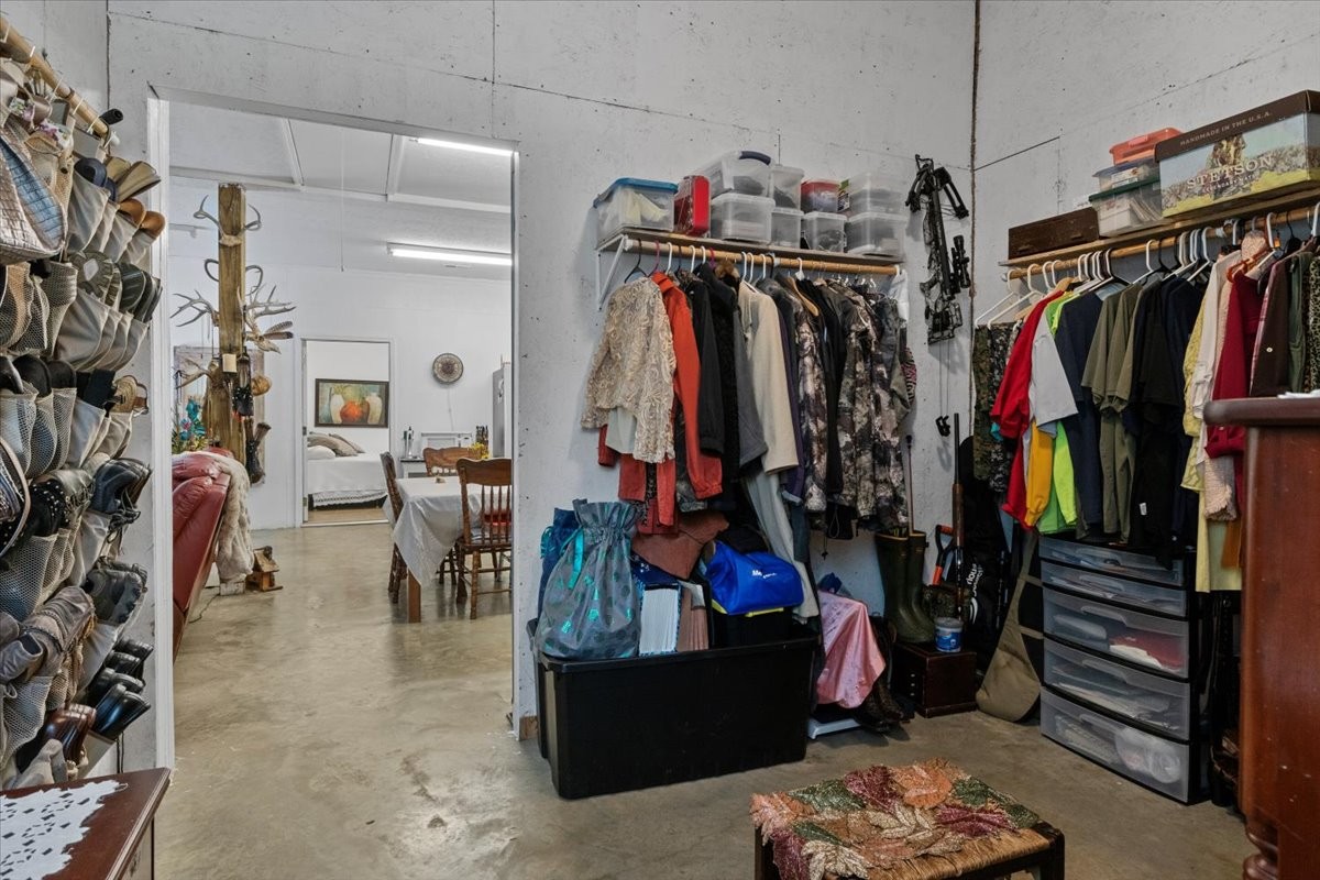 100 Croff Lane McEwen, TN 37101 - Photo 20 of 63 a view of walk in closet with clothes and shoes