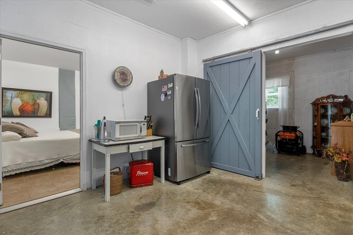 100 Croff Lane McEwen, TN 37101 - Photo 23 of 63 a kitchen with refrigerator and mirror