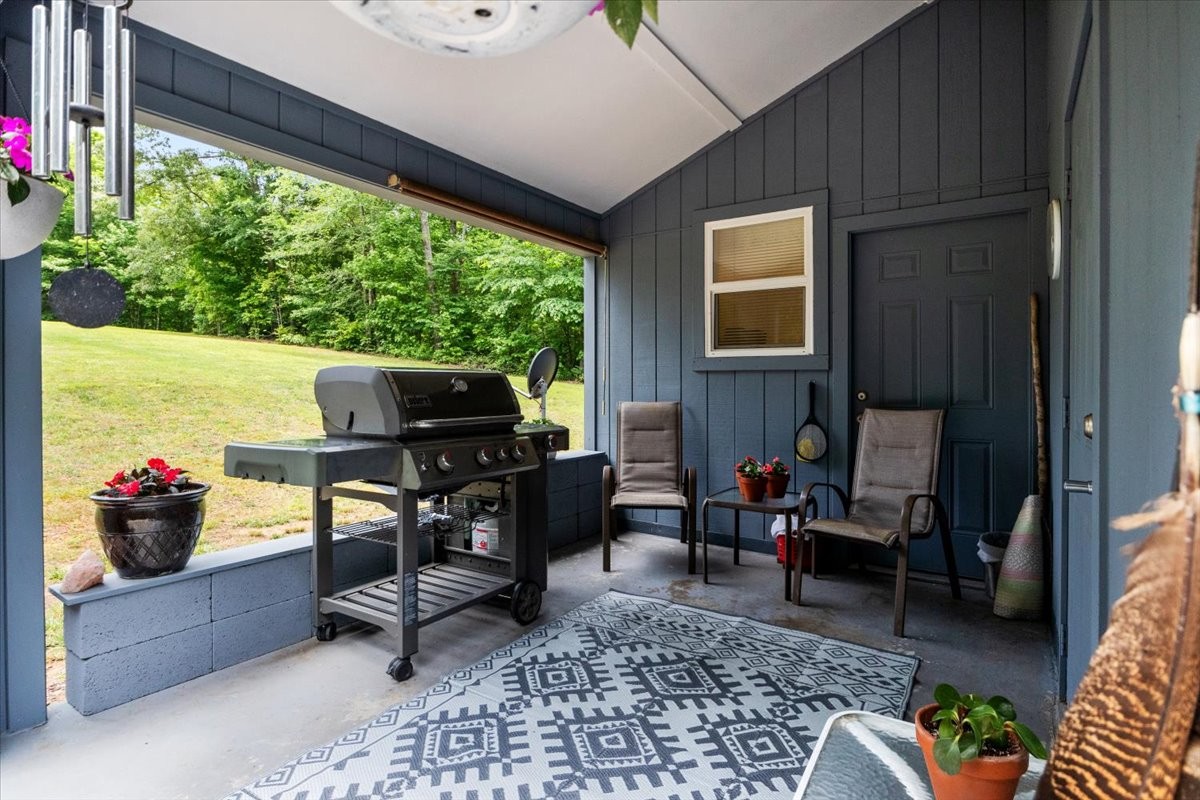 100 Croff Lane McEwen, TN 37101 - Photo 29 of 63 a living room with furniture and a flat screen tv