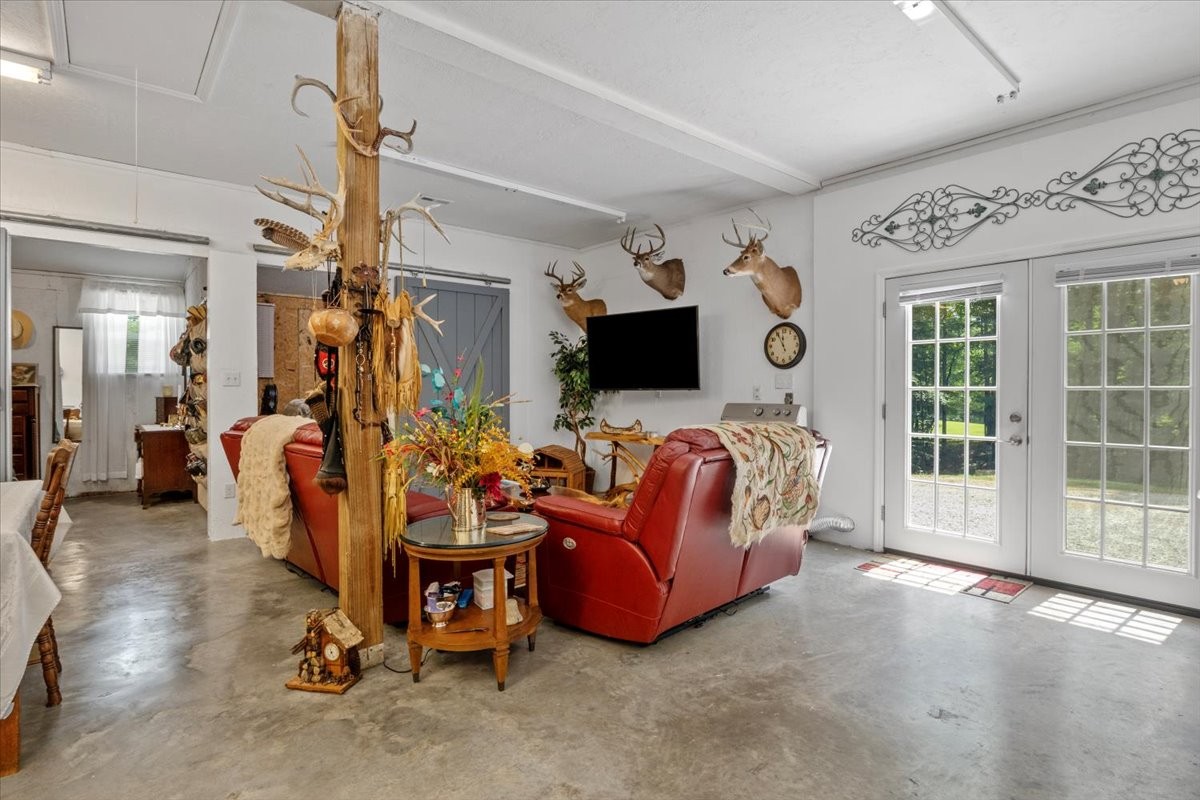 100 Croff Lane McEwen, TN 37101 - Photo 7 of 63 a bedroom with furniture and a flat screen tv