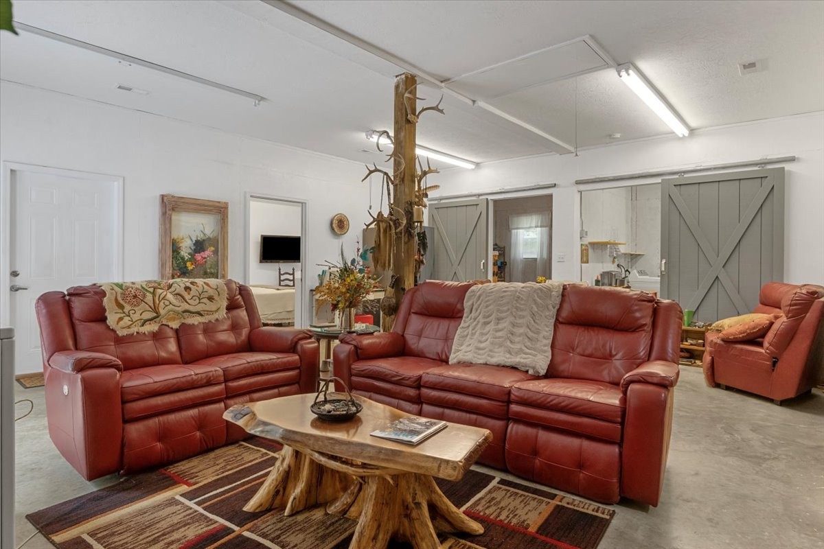 100 Croff Lane McEwen, TN 37101 - Photo 8 of 63 a living room with furniture a ceiling fan and a window