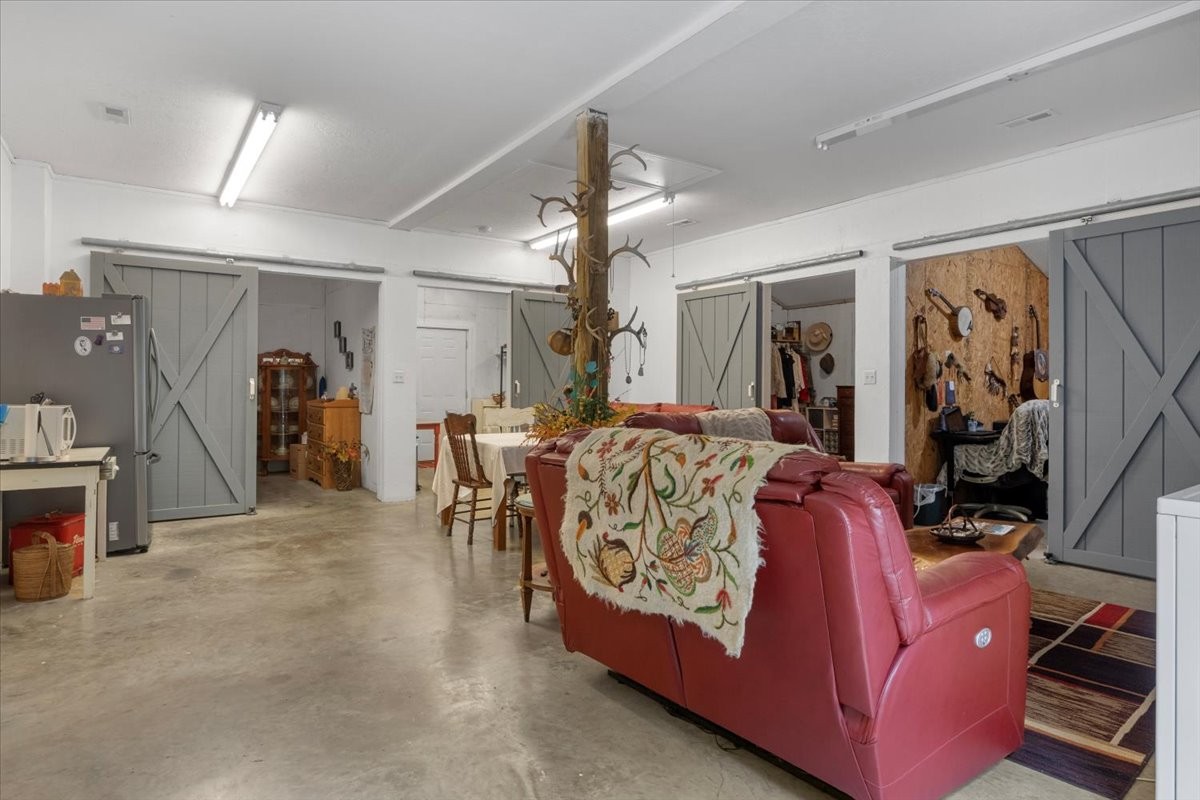 100 Croff Lane McEwen, TN 37101 - Photo 9 of 63 a living room with furniture and a flat screen tv