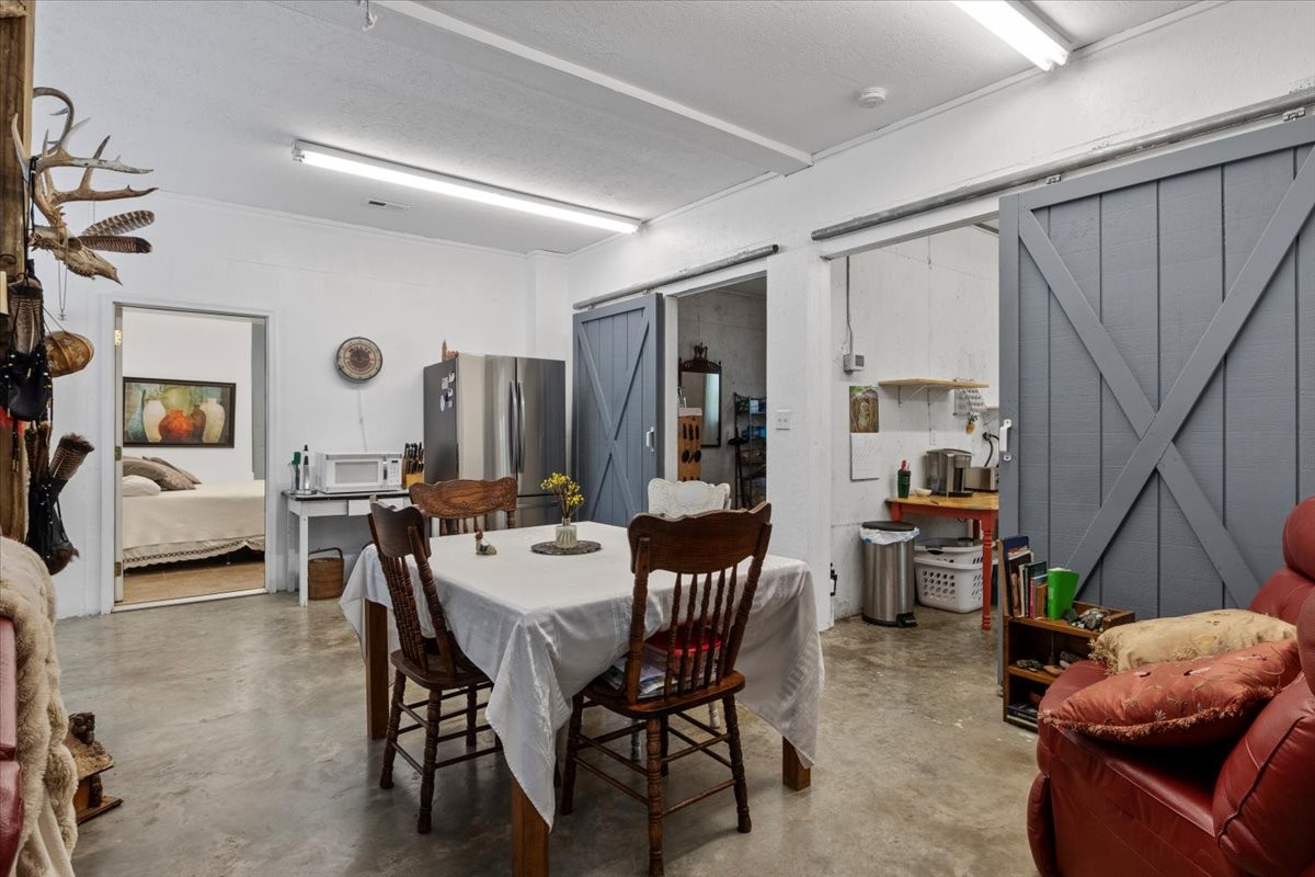 100 Croff Lane McEwen, TN 37101 - Photo 10 of 63 a dining room with furniture and wooden floor