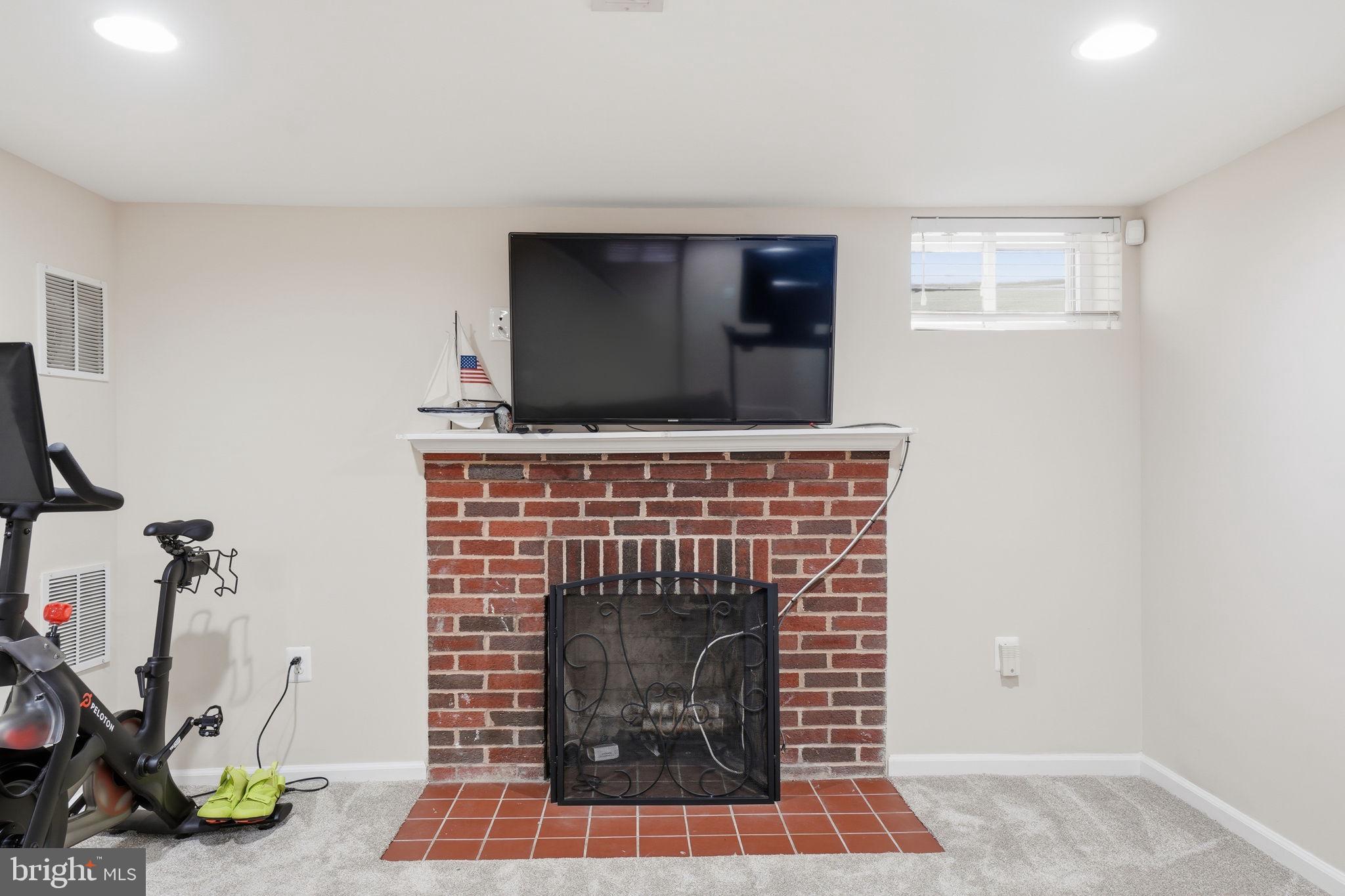 31 Milmarson Place Northwest Washington, DC 20011 - Photo 34 of 57 Lower Level Rec Room with Fireplace