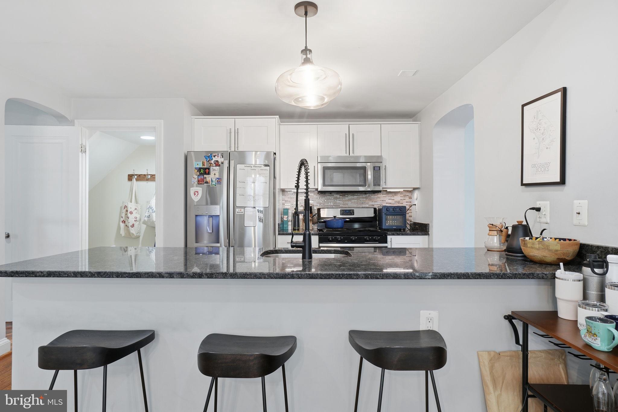 31 Milmarson Place Northwest Washington, DC 20011 - Photo 10 of 57 Kitchen with Breakfast Bar