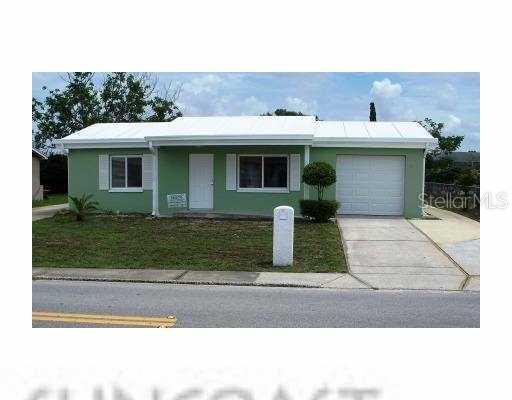 8246 Dedham Drive Port Richey, FL 34668 - Photo 1 of 1 Exterior Front