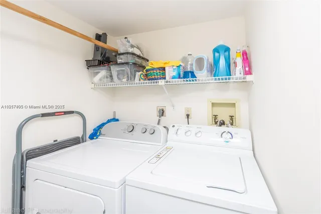 a utility room with dryer and washer