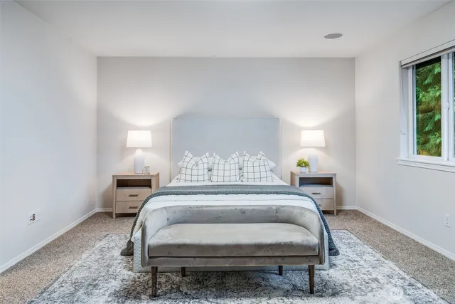 a view of backyard with a table and chairs