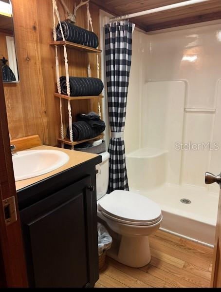 25235 142nd Lane Northeast, Unit 185 Fort McCoy, FL 32134 - Photo 11 of 49 a bathroom with a toilet and a shower