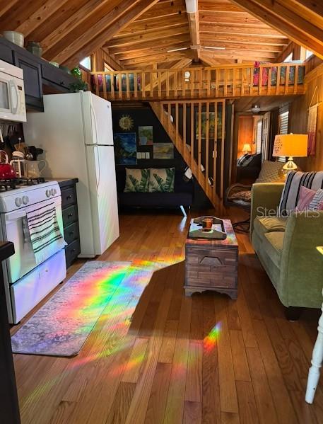 25235 142nd Lane Northeast, Unit 185 Fort McCoy, FL 32134 - Photo 13 of 49 a view of storage and utility room with wooden floor