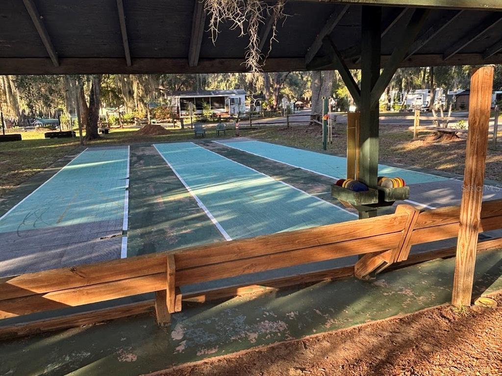 25235 142nd Lane Northeast, Unit 185 Fort McCoy, FL 32134 - Photo 36 of 49 a view of outdoor space with seating area