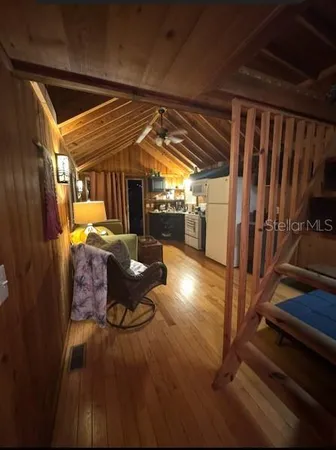 a view of swimming pool with outdoor seating