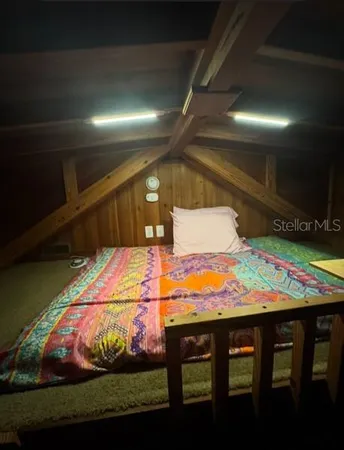 a room with table tennis table and chairs