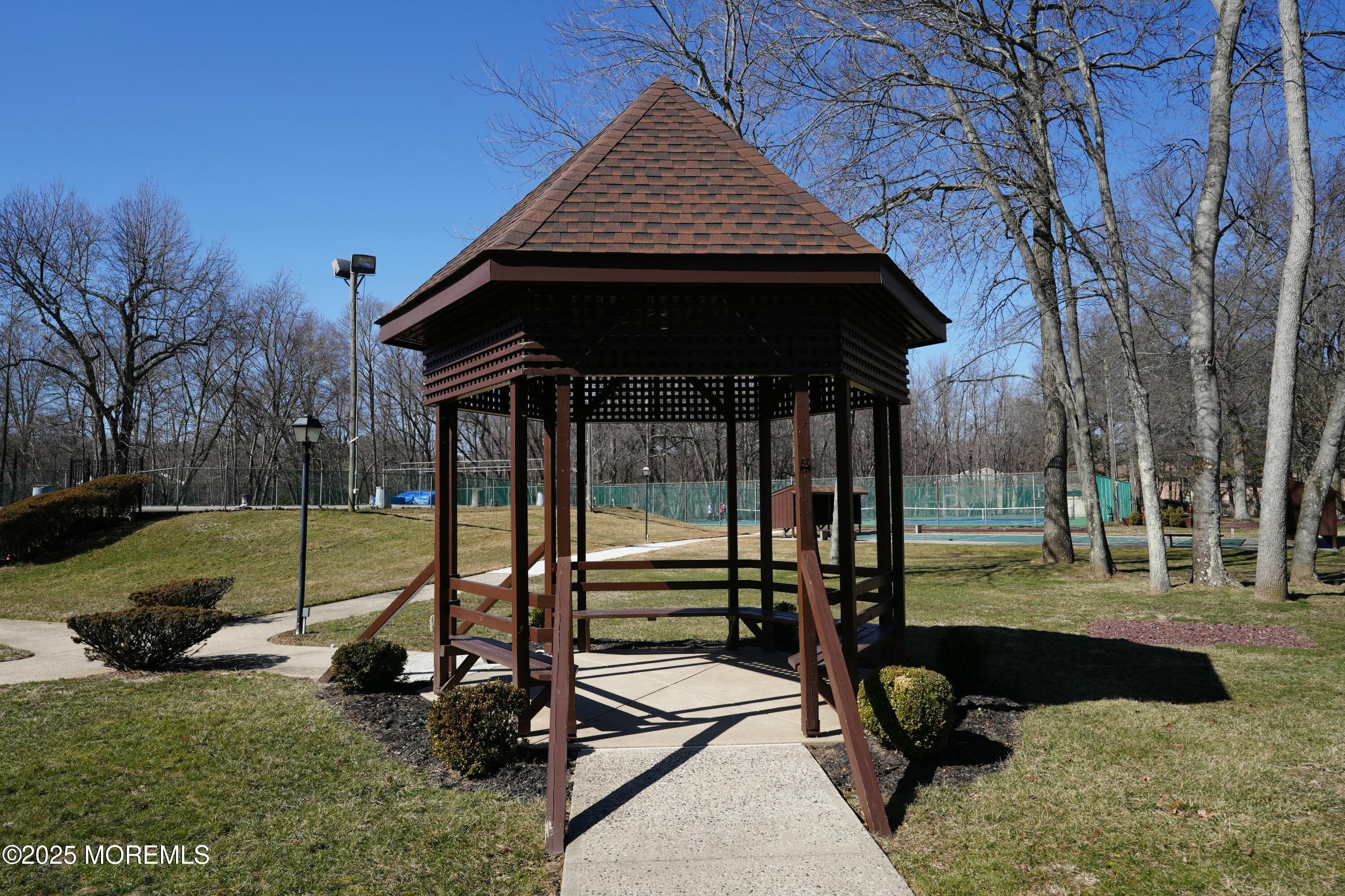 98 Arrowood Road, Unit K Manalapan, NJ 07726 - Photo 27 of 28 Covered Bridge