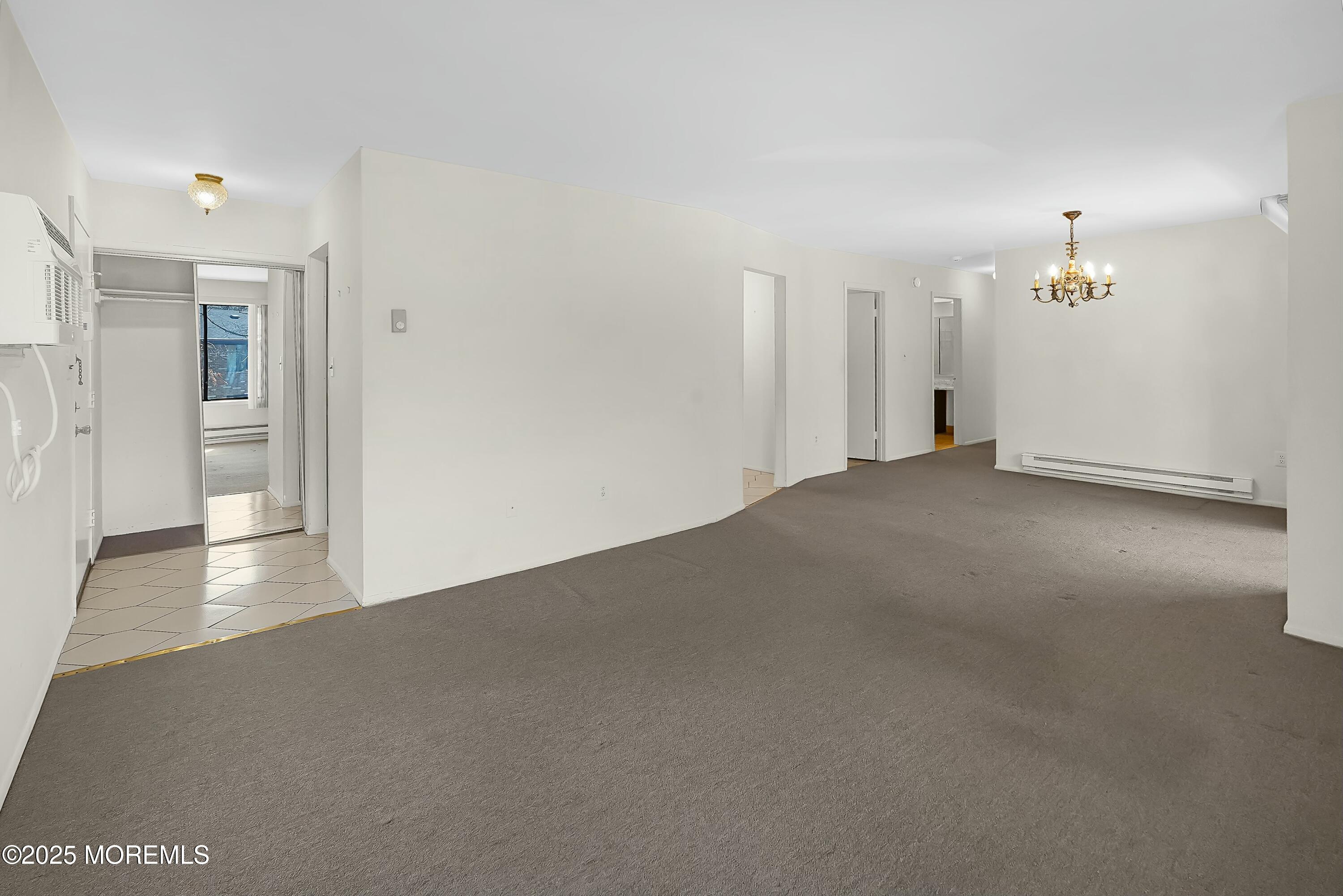 98 Arrowood Road, Unit K Manalapan, NJ 07726 - Photo 4 of 28 living/ dining