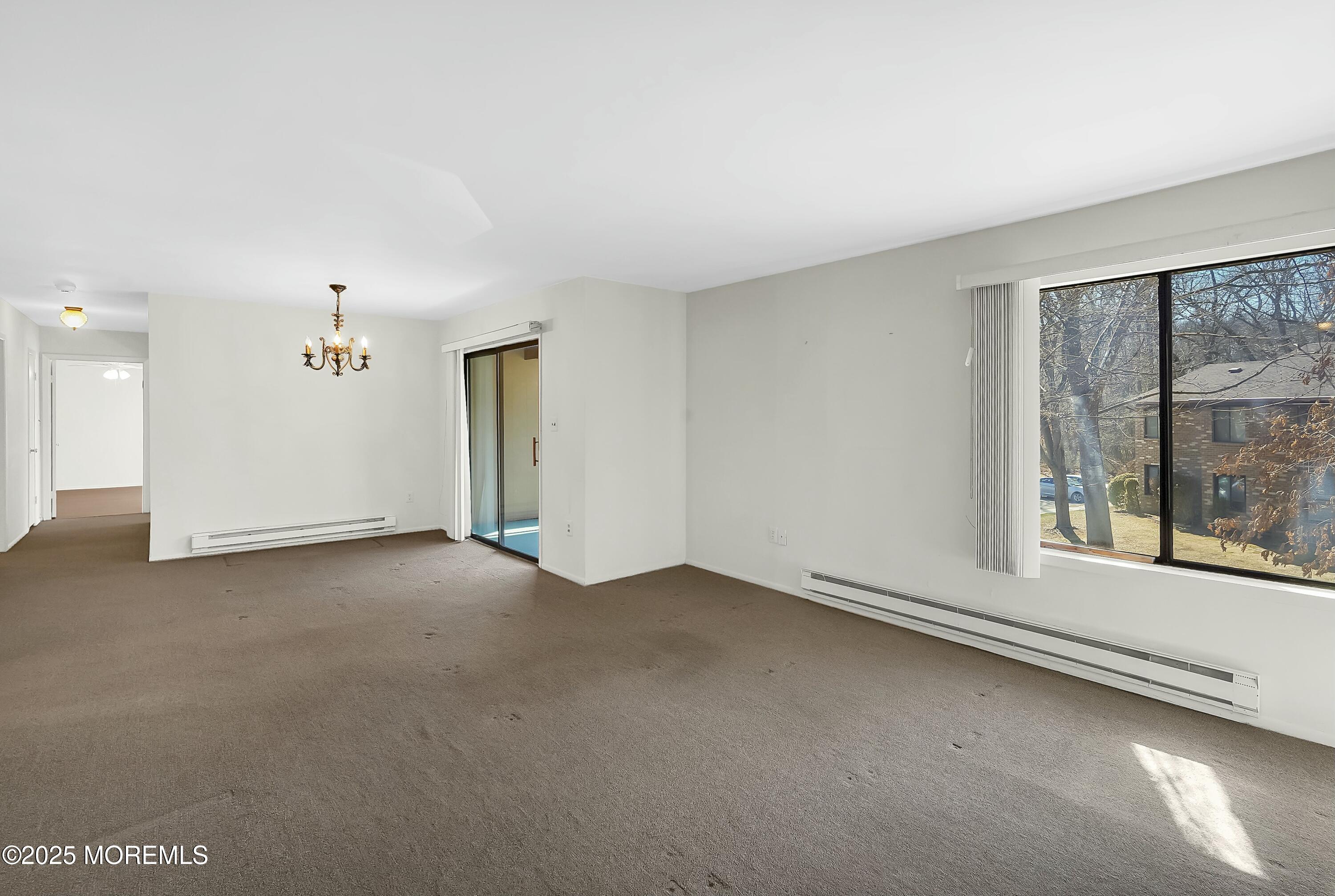 98 Arrowood Road, Unit K Manalapan, NJ 07726 - Photo 5 of 28 living/ dining