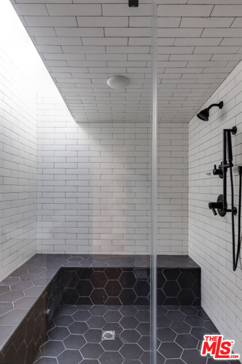 3629 Serra Road Malibu, CA 90265 - Photo 7 of 18 a bathroom with a shower