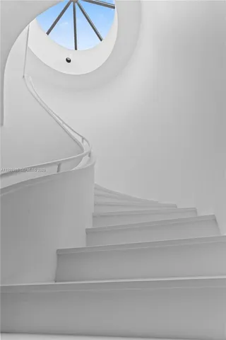 a bathroom with a tub and shower