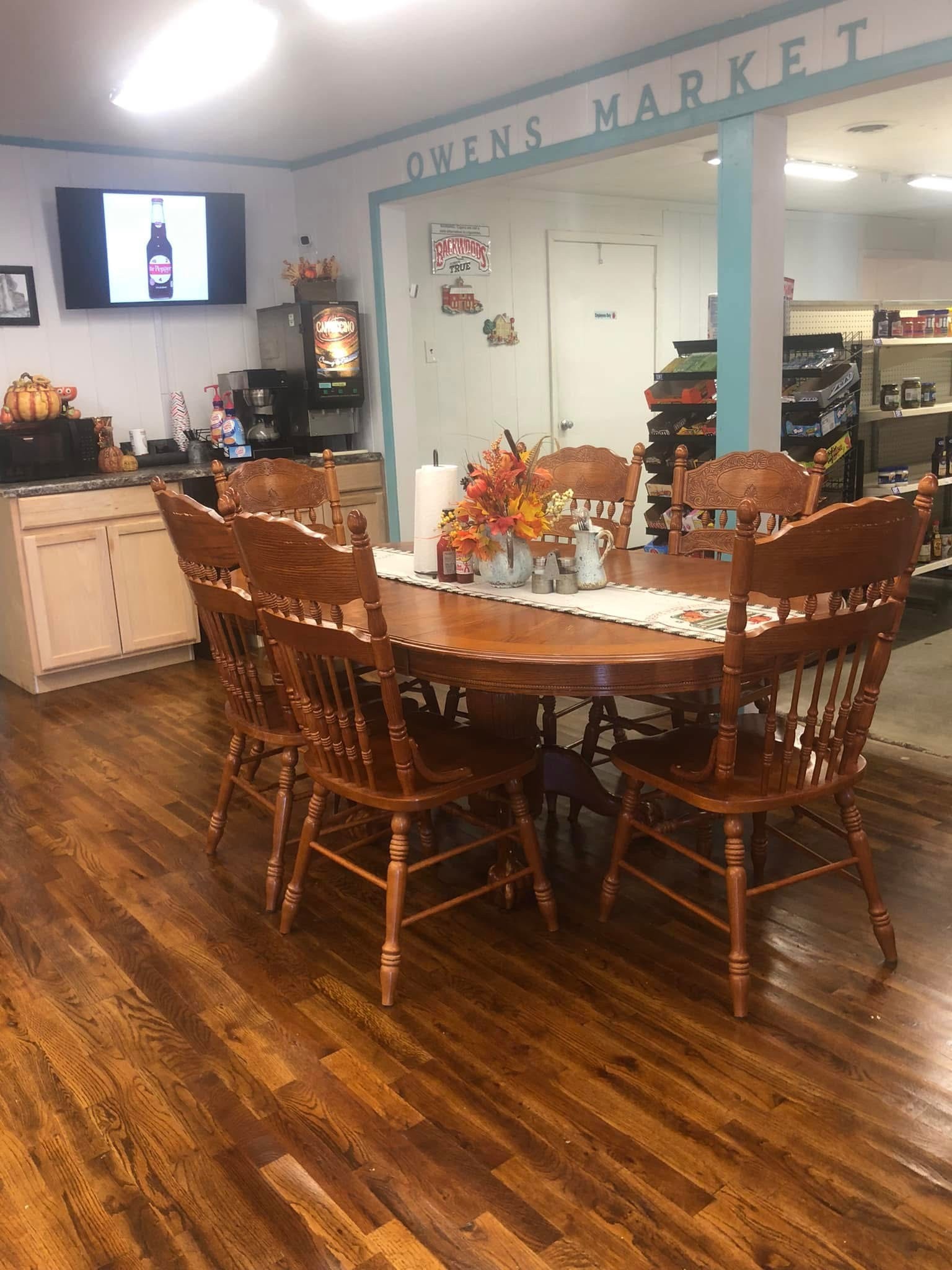 7089 Short Mountain Road McMinnville, TN 37110 - Photo 12 of 36 a view of a dining room with furniture and wooden floor
