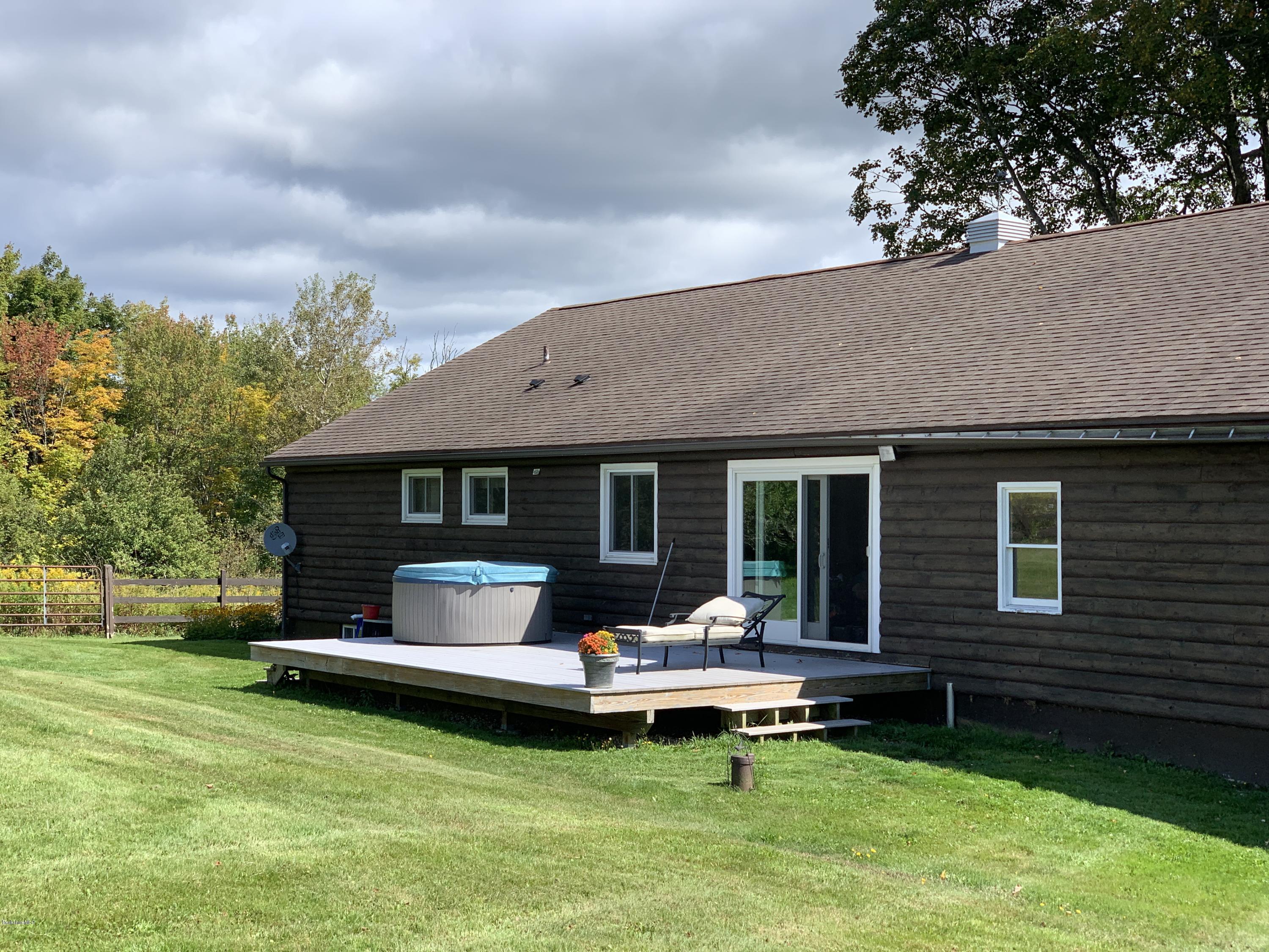 100 Jackson Road Savoy, MA 01256 - Photo 16 of 38 a house view with a sitting space garden view with a tree