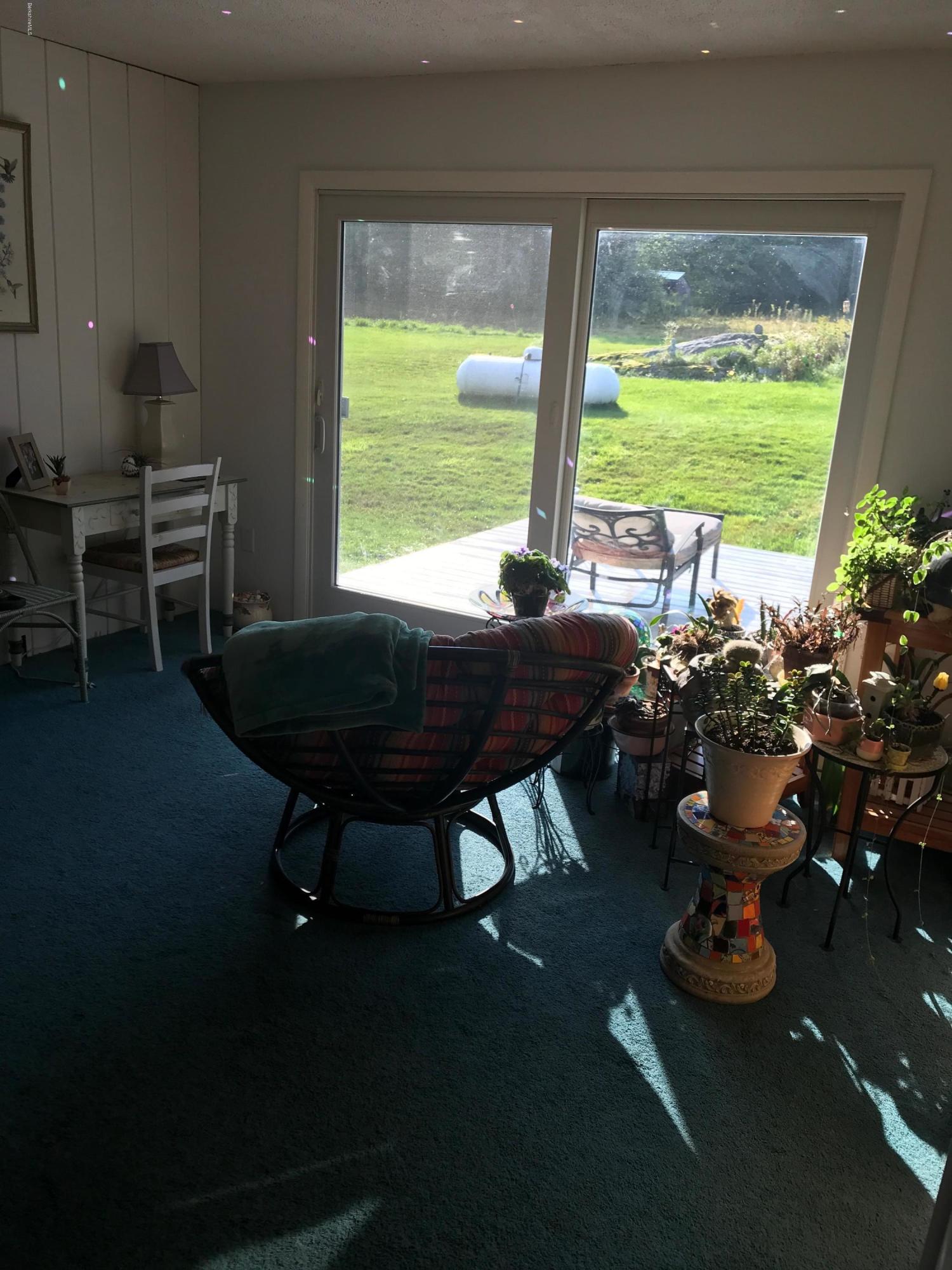 100 Jackson Road Savoy, MA 01256 - Photo 9 of 38 a room with furniture and a large window