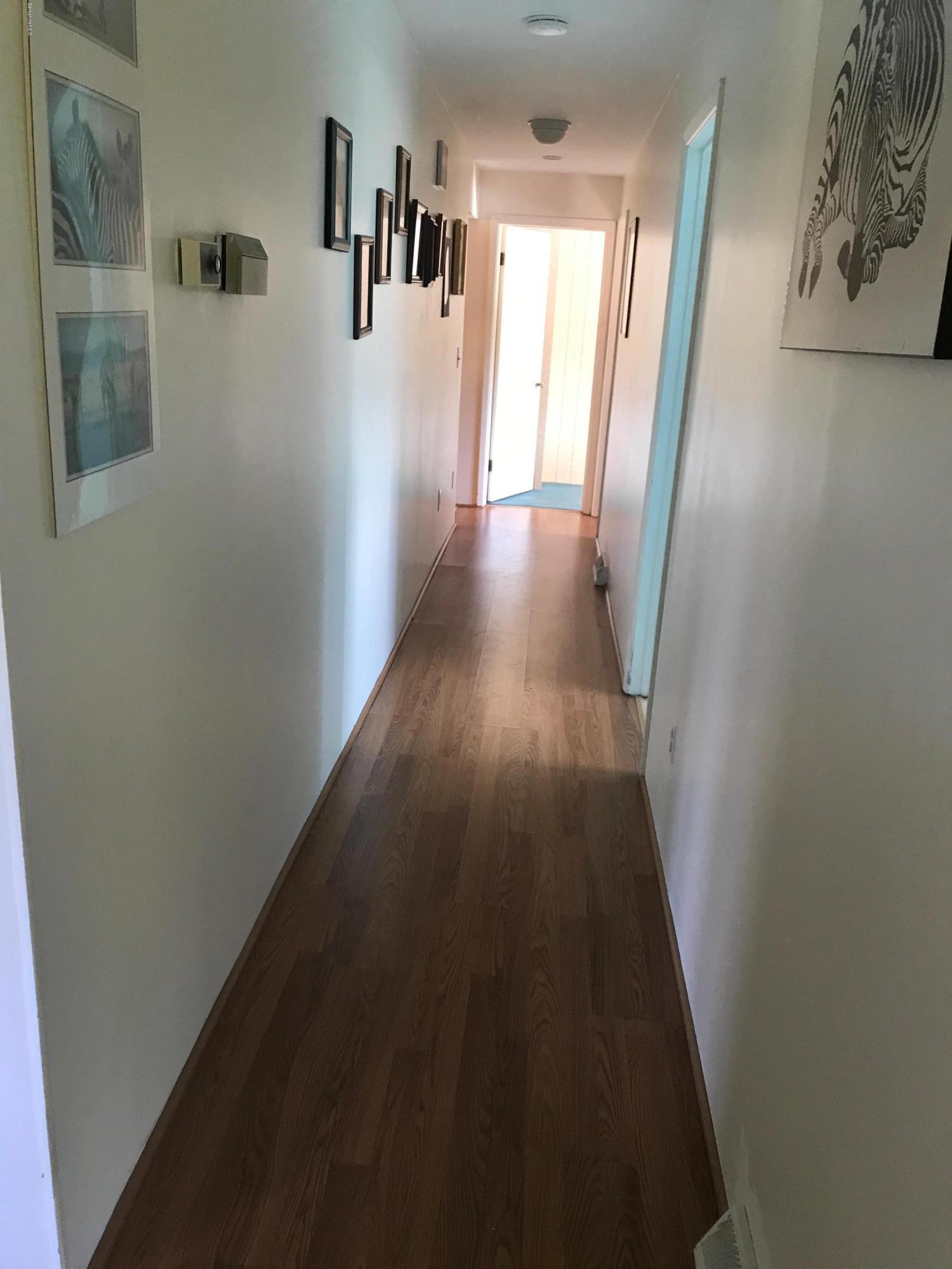 100 Jackson Road Savoy, MA 01256 - Photo 10 of 38 a view of a hallway with wooden floor
