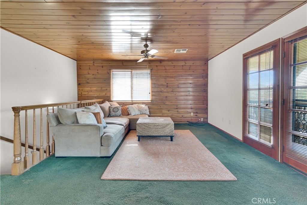 2471 Captains Walk Bradley, CA 93426 - Photo 12 of 42 a living room with furniture and a chandelier