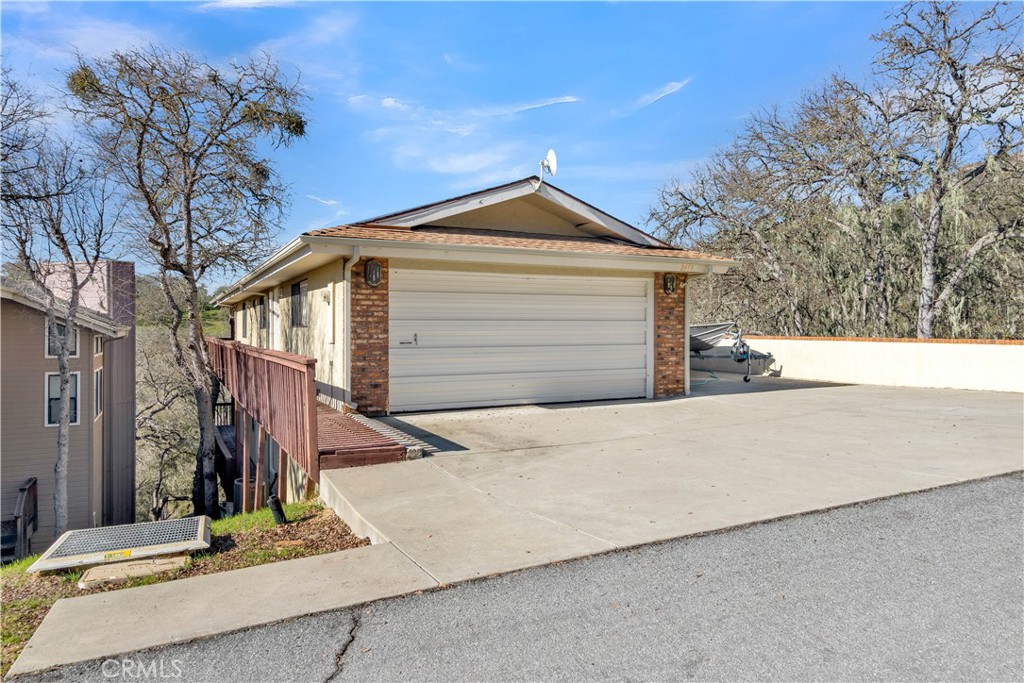 2471 Captains Walk Bradley, CA 93426 - Photo 3 of 42 a front view of a house with a garage