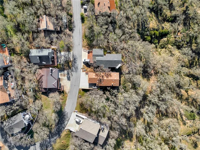 an aerial view of residential house with outdoor space