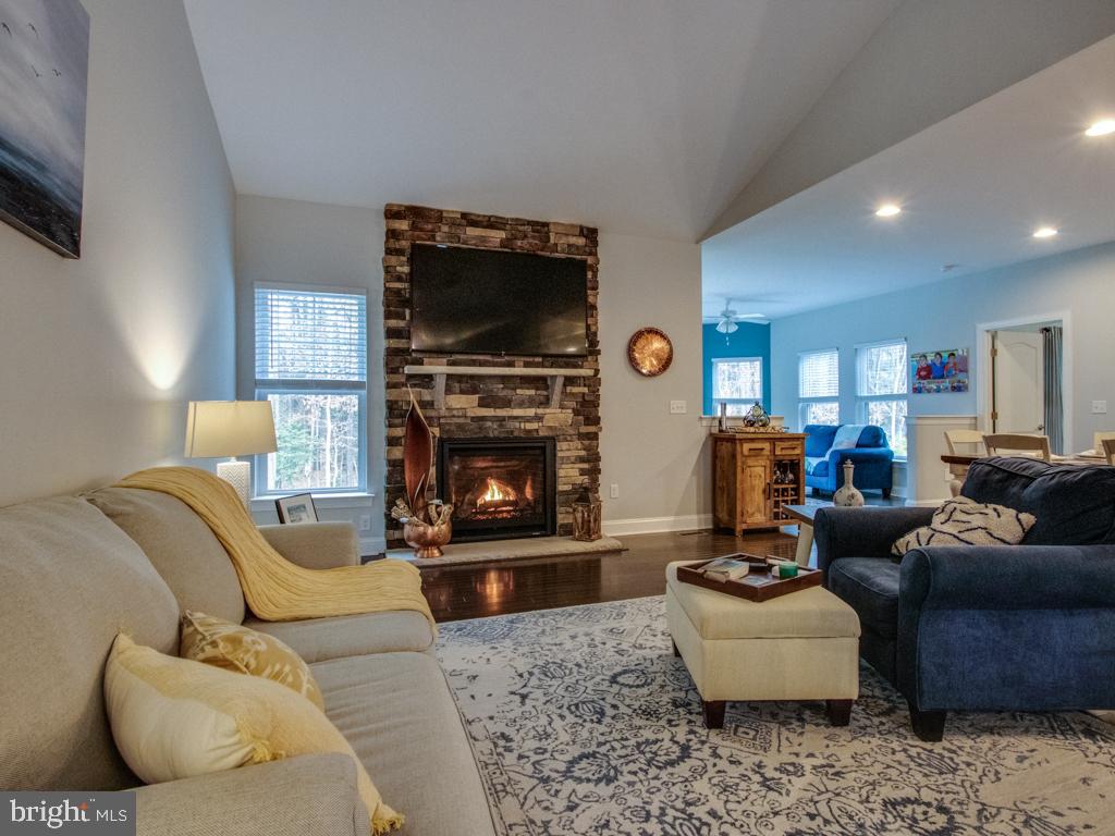18161 Emerson Way Georgetown, DE 19947 - Photo 2 of 36 Vaulted ceilings, centered stone fireplace