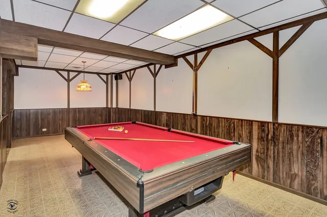 a view of balcony with deck and yard