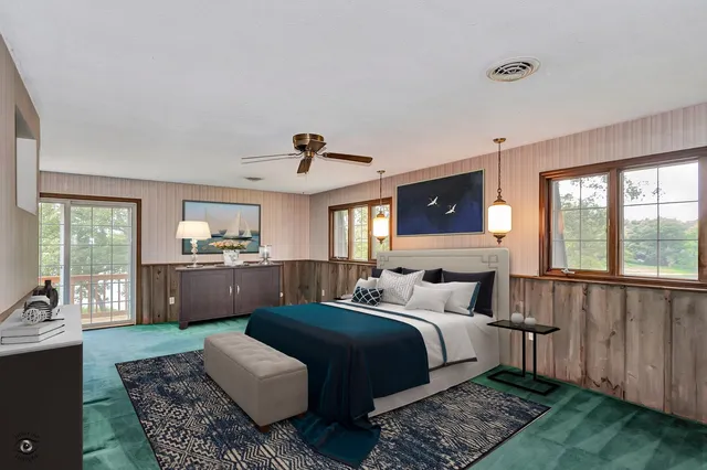 a bathroom with a sink a toilet and a window