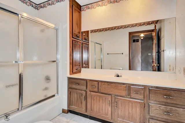a kitchen with stainless steel appliances granite countertop a stove and a microwave