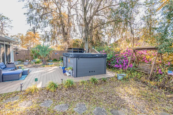 a view of backyard and tree